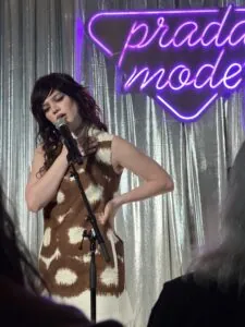 sophie thatcher first live music performance prada mode