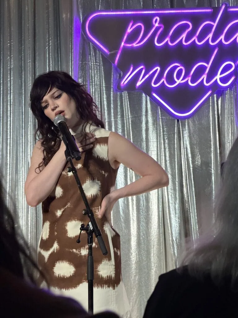 sophie thatcher first live music performance prada mode